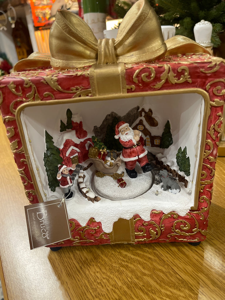 Pacco natalizio con carillon e luci