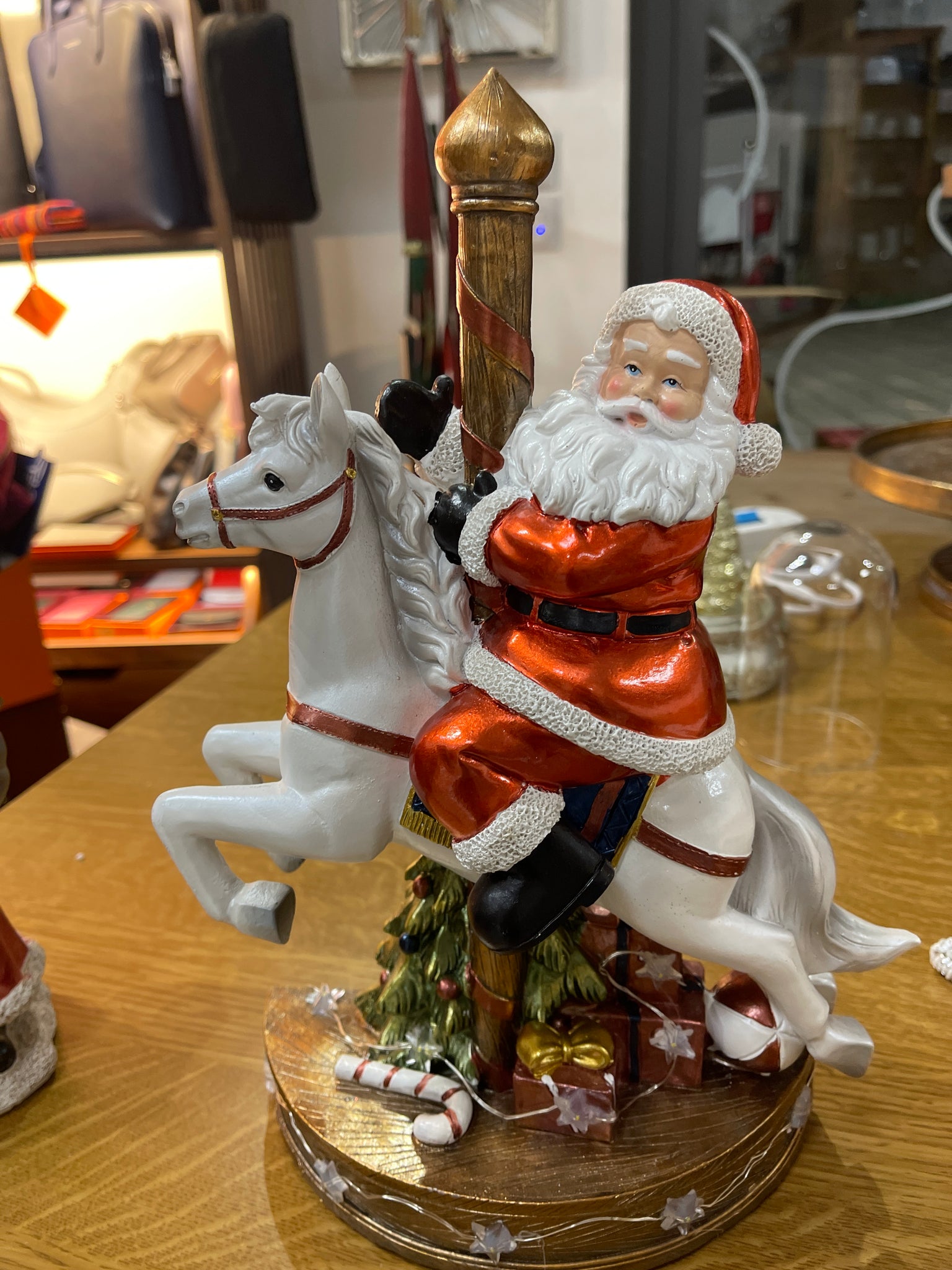 Babbo Natale a cavallo con luci e suoni