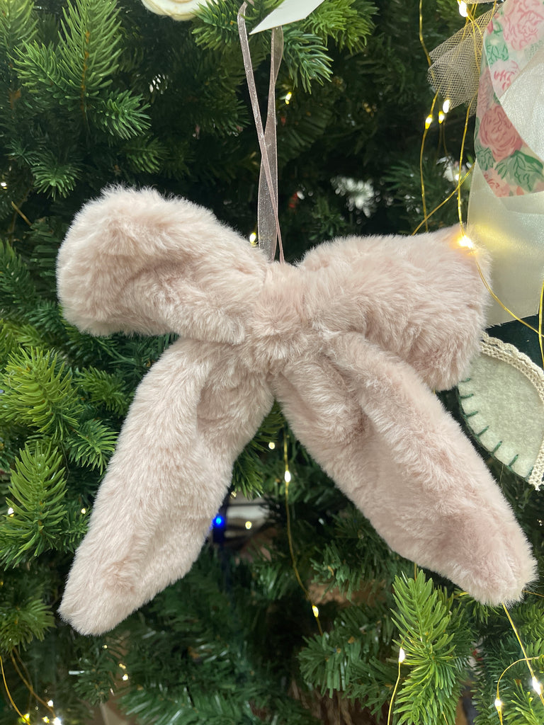 Fiocco decorativo pelliccia in due varianti di rosa