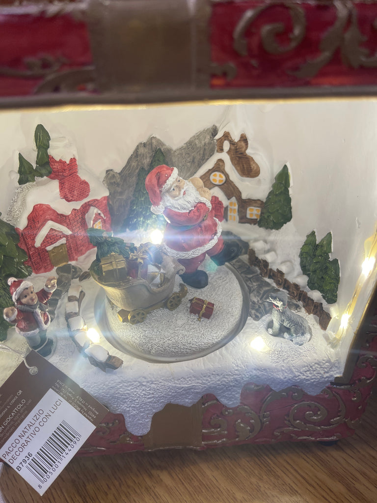 Pacco natalizio con carillon e luci