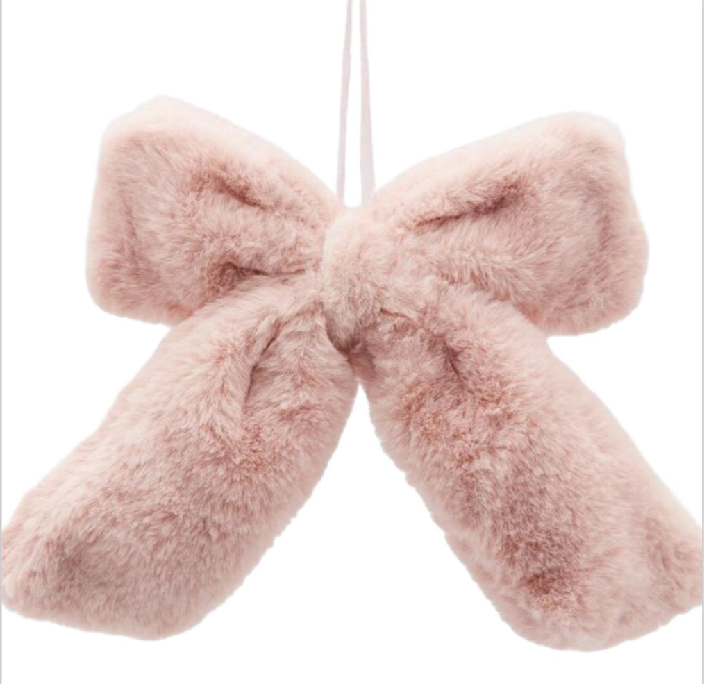 Fiocco decorativo pelliccia in due varianti di rosa